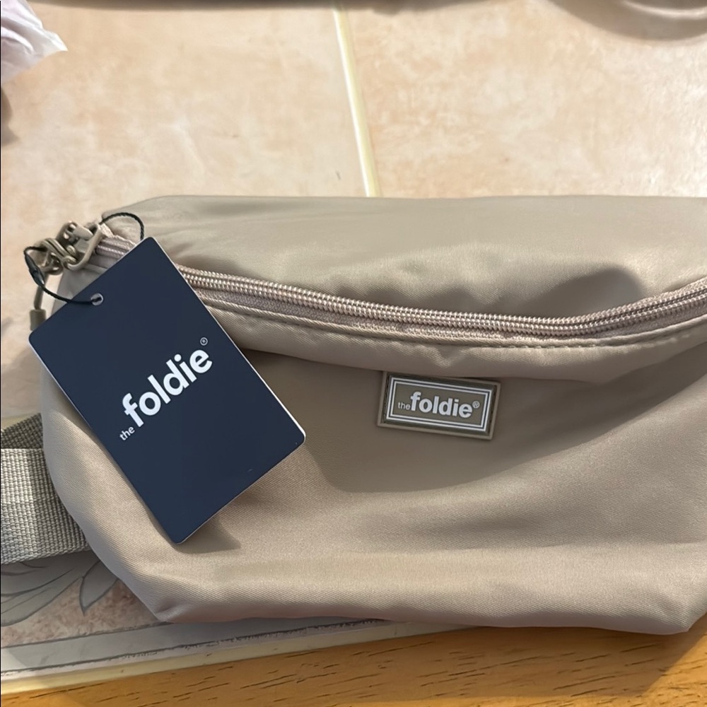 Tan Crossbody Bag with Sleek Design and Versatile Style